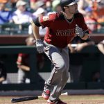 Arizona Diamondbacks' A.J. Pollock watches his solo home run during the first inning of the team's spring training baseball game against the San Francisco Giants, Sunday, March 12, 2017, in Scottsdale, Ariz. (AP Photo/Darron Cummings)