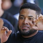 Chicago White Sox left fielder Melky Cabrera celebrates his run scored against the Arizona Diamondbacks with teammates in the dugout during the first inning of a spring training baseball game Thursday, March 9, 2017, in Glendale, Ariz. (AP Photo/Ross D. Franklin)
