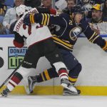 Buffalo Sabres forward Kyle Okposo (21) and Arizona Coyotes defenseman Oliver Ekman-Larsson (23) get tied up along the boards during the first period of an NHL hockey game, Thursday, March. 2, 2017, in Buffalo, N.Y. (AP Photo/Jeffrey T. Barnes)