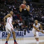 Xavier guard Trevon Bluiett, center, drives to the basket against Arizona during the first half of an NCAA Tournament college basketball regional semifinal game Thursday, March 23, 2017, in San Jose, Calif. (AP Photo/Tony Avelar)