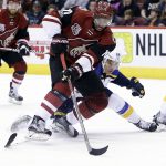 Arizona Coyotes left wing Anthony Duclair (10) shields the puck from St. Louis Blues right wing Nail Yakupov in the second period during an NHL hockey game, Wednesday, March 29, 2017, in Glendale, Ariz. (AP Photo/Rick Scuteri)