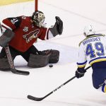 Arizona Coyotes goalie Mike Smith (41) makes a save on a shot by St. Louis Blues center Ivan Barbashev (49) during the first period of an NHL hockey game Saturday, March 18, 2017, in Glendale, Ariz. (AP Photo/Ross D. Franklin)