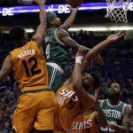Boston Celtics guard Isaiah Thomas (4) drives on Phoenix Suns forward Alan Williams (15) in the fourth quarter during an NBA basketball game, Sunday, March 5, 2017, in Phoenix. Phoenix defeated Boston 109-106. (AP Photo/Rick Scuteri)