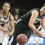 Arizona State guard Kiara Russell (4) battles for a loose ball against Michigan State guard Lexi Gussert, right, during a first-round game in the women's NCAA college basketball tournament Friday, March 17, 2017, in Columbia, S.C. Arizona State defeated Michigan State 73-61. (AP Photo/Sean Rayford)