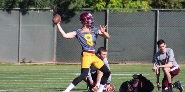Arizona State quarterback Blake Barnett pulls back for the throw during spring workouts on Tuesday,...