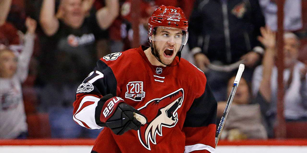 Arizona Coyotes defenseman Anthony DeAngelo celebrates his goal against the New Jersey Devils durin...