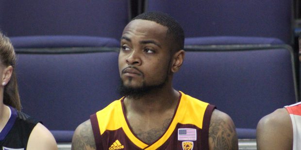 Arizona State guard Torian Graham listens in during the slam dunk and three-point contest rundown a...