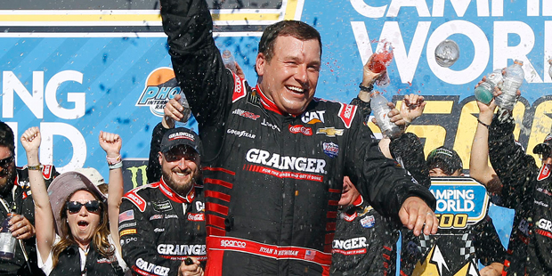 Ryan Newman celebrates in Victory Lane after winning the NASCAR Cup Series auto race at Phoenix Int...