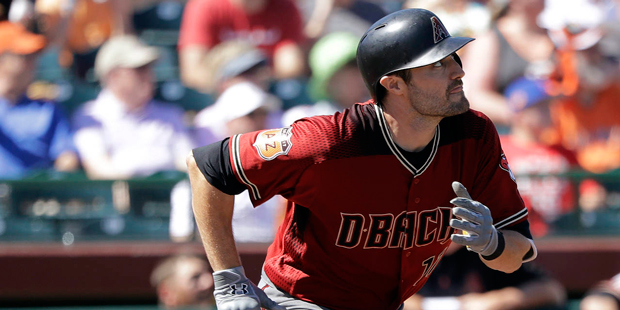 Arizona Diamondbacks' A.J. Pollock watches his solo home run during the first inning of the team's ...
