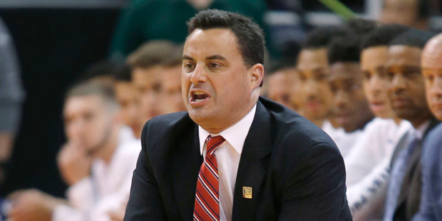 Arizona coach Sean Miller give directions to his players during the first half of a first-round men...
