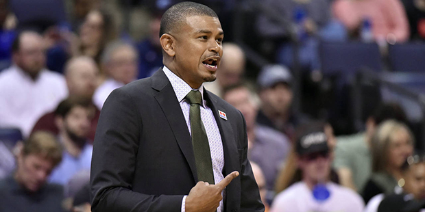 Phoenix Suns head coach Earl Watson gestures from the sideline in the first half of an NBA basketba...