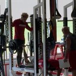 Safety Tyrann Mathieu plays the role of spotter during workouts Monday, April 17. (Photo by Adam Green/Arizona Sports)