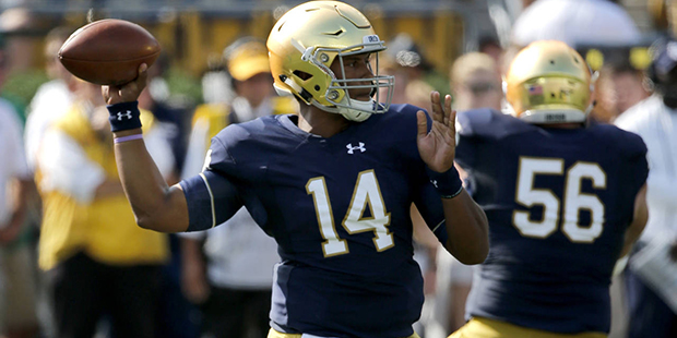 Notre Dame quarterback DeShone Kizer passes during the first half of an NCAA college football game ...
