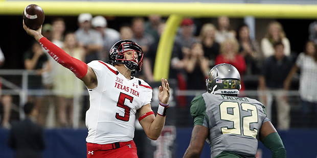 FILE - In this Oct. 3, 2015, file photo, Texas Tech quarterback Patrick Mahomes (5) throws a long t...