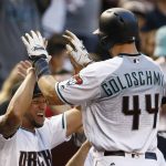 Arizona Diamondbacks' Paul Goldschmidt (44) celebrates his home run against the San Diego Padres with David Peralta, left, during the first inning of a baseball game Tuesday, April 25, 2017, in Phoenix. (AP Photo/Ross D. Franklin)
