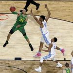 Oregon's Dillon Brooks (24) goes up for a basket against North Carolina's Tony Bradley (5) during the first half in the semifinals of the Final Four NCAA college basketball tournament, Saturday, April 1, 2017, in Glendale, Ariz. (AP Photo/David J. Phillip)