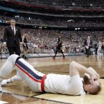 Gonzaga center Przemek Karnowski rests on the court after getting injured during the first half against South Carolina in the semifinals of the Final Four NCAA college basketball tournament, Saturday, April 1, 2017, in Glendale, Ariz. (AP Photo/David J. Phillip)