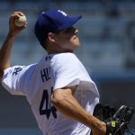 Los Angeles Dodgers starting pitcher Rich Hill throws to the plate during the first inning of a baseball game against the Arizona Diamondbacks, Sunday, April 16, 2017, in Los Angeles. (AP Photo/Mark J. Terrill)