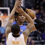 Oklahoma City Thunder guard Russell Westbrook is pressured by Phoenix Suns guard Tyler Ulis (8) during the first half of an NBA basketball game, Friday, April 7, 2017, in Phoenix. (AP Photo/Matt York)