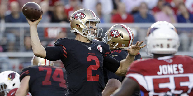 San Francisco 49ers quarterback Blaine Gabbert (2) passes against the Arizona Cardinals during the ...