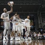 Gonzaga center Przemek Karnowski (24) celebrates with teammates on the bench during the second half against South Carolina in the semifinals of the Final Four NCAA college basketball tournament, Saturday, April 1, 2017, in Glendale, Ariz. (AP Photo/David J. Phillip)