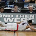 Gonzaga's Nigel Williams-Goss (5) dives for a loose ball during the second half in the semifinals of the Final Four NCAA college basketball tournament against South Carolina, Saturday, April 1, 2017, in Glendale, Ariz. (AP Photo/Matt York)