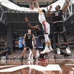 Gonzaga's Zach Collins dunks during the first half in the semifinals of the Final Four NCAA college basketball tournament against South Carolina, Saturday, April 1, 2017, in Glendale, Ariz. (AP Photo/Chris Steppig, Pool)
