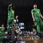 Oregon's Kavell Bigby-Williams (35) and Keith Smith (11) walk off the court after a semifinal against North Carolina in the Final Four NCAA college basketball tournament, Saturday, April 1, 2017, in Glendale, Ariz. North Carolina won 77-76. (AP Photo/David J. Phillip)