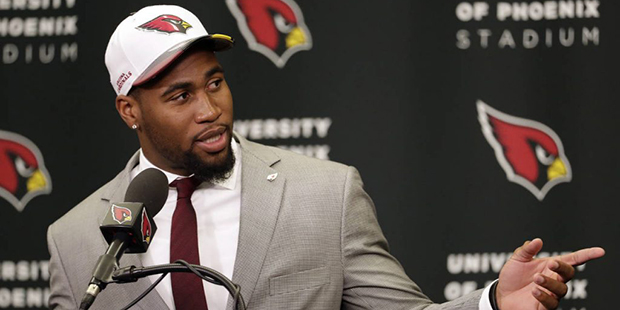 Arizona Cardinals' first-round draft pick Haason Reddick speaks after being introduced at the teams...