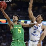 Oregon guard Tyler Dorsey (5) drives to the basket past North Carolina forward Kennedy Meeks (3) during the second half in the semifinals of the Final Four NCAA college basketball tournament, Saturday, April 1, 2017, in Glendale, Ariz. (AP Photo/Mark Humphrey)