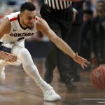 Gonzaga's Nigel Williams-Goss (5) chases a loose ball during the second half in the semifinals of the Final Four NCAA college basketball tournament against South Carolina, Saturday, April 1, 2017, in Glendale, Ariz. (AP Photo/Charlie Neibergall)