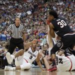 South Carolina forward Chris Silva (30) picks up a loose ball over Gonzaga's Johnathan Williams (3) and Przemek Karnowski (24) during the second half in the semifinals of the Final Four NCAA college basketball tournament, Saturday, April 1, 2017, in Glendale, Ariz. (AP Photo/Mark Humphrey)