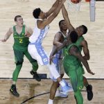 North Carolina forward Isaiah Hicks dunks the ball over Oregon defenders during the first half in the semifinals of the Final Four NCAA college basketball tournament, Saturday, April 1, 2017, in Glendale, Ariz. (AP Photo/David J. Phillip)