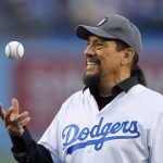 Actor Danny Trejo gets set to throw out the ceremonial first pitch prior to a baseball game between the Los Angeles Dodgers and the Arizona Diamondbacks, Monday, April 17, 2017, in Los Angeles. (AP Photo/Mark J. Terrill)