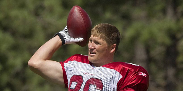 FILE - In this Aug. 4, 2011 file photo, Arizona Cardinals' Todd Heap warms up at NFL football train...