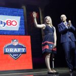 Kate Foster, 18, of Rockford, Ill., left, accompanied by former Chicago Bears center Jay Hilgenberg, announces Ashland's Adam Shaheen as the Bears' selection in the second round of the 2017 NFL football draft, Friday, April 28, 2017, in Philadelphia. (AP Photo/Matt Rourke)