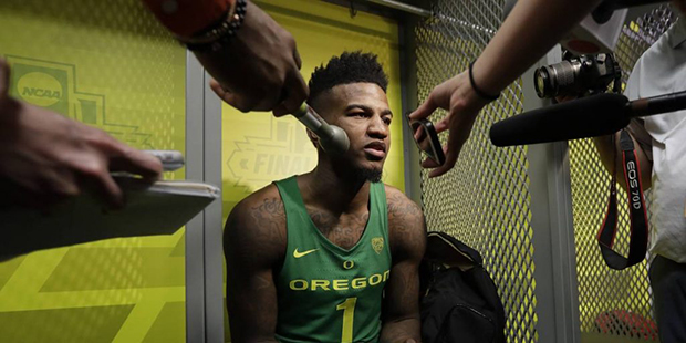 Oregon's Jordan Bell (1) is interviewed in the locker room after the semifinals against North Carol...