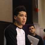 Suns guard Devin Booker talks to the media during exit interviews at Talking Stick Resort Arena in Phoenix. (Photo by Logan Newman/Cronkite News)