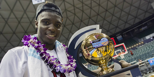 San Diego State forward Zylan Cheatham, holds the Diamond Head Classic championship trophy after an...