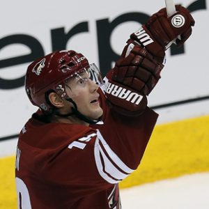 Arizona Coyotes right wing Shane Doan (19) celebrates after scoring a goal in the second period during an NHL hockey game against the Winnipeg Jets, Thursday, Jan. 8, 2015, in Glendale, Ariz. (AP Photo/Rick Scuteri)