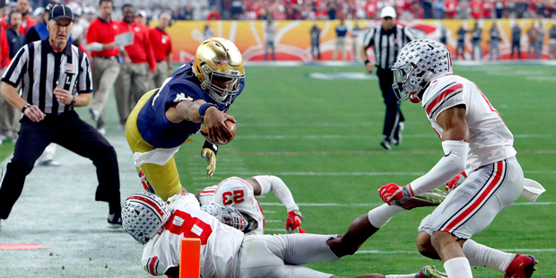 Notre Dame quarterback DeShone Kizer (14) lunges for the goal line but is stopped short by Ohio Sta...