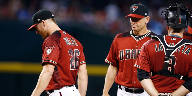 Arizona Diamondbacks' Shelby Miller (26) leaves the game as he is taken out by manager Torey Lovull...