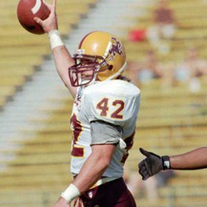 FILE - In this Oct. 18, 1997, file photo, Arizona State linebacker Pat Tillman, left, holds up the ball as he is congratulated by free safety Mitchell Freedman, right, after Tillman intercepted a pass by Stanford quarterback Chad Hutchinson during the second quarter of an NCAA college football game at Stanford, Calif., Stadium. The late Pat Tillman and Heisman Trophy winner Desmond Howard are among the 14 newly elected members of the College Football Hall of Fame on Thursday, May 27, 2010. Tillman was killed while serving in Afghanistan in 2004 (AP Photo/Paul Sakuma, File)