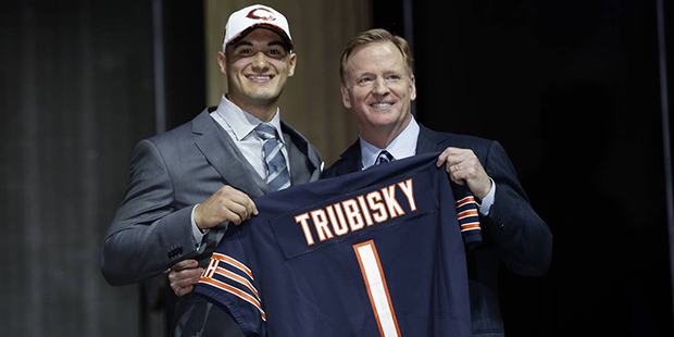 North Carolina's Mitch Trubisky, left, poses with NFL commissioner Roger Goodell after being select...