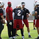 QB coach Byron Leftwich chats with his QBs during Arizona Cardinals OTAs Tuesday, May 16. (Photo by Adam Green/Arizona Sports)