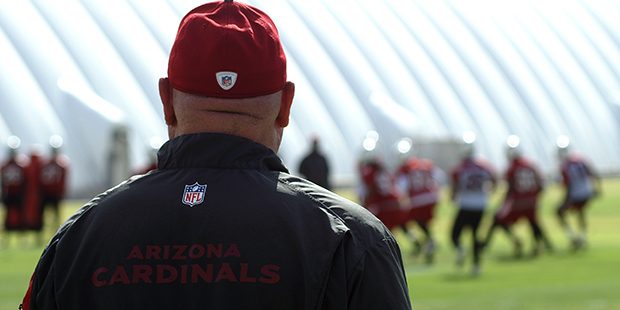 Cardinals coach Bruce Arians watches his team during an OTA practice May 16. (Photo by Adam Green/A...