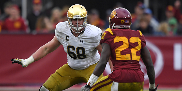 Notre Dame offensive lineman Mike McGlinchey, left, tries to hold back Southern California defensiv...