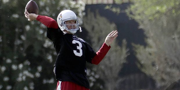 Arizona Cardinals NFL football quarterback Carson Palmer (3) runs drills during a voluntary team wo...