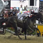 Cloud Computing (2), ridden by Javier Castellano, wins142nd Preakness Stakes horse race at Pimlico race course as Classic Empire with Julien Leparoux aboard takes second, Saturday, May 20, 2017, in Baltimore. (AP Photo/Mike Stewart)