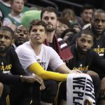 Cleveland Cavaliers, from left to right, Kyrie Irving, Kyle Korver, Kevin Love, Tristan Thompson and LeBron James watch from the bench during the second half of Game 2 of the NBA basketball Eastern Conference finals against the Boston Celtics, Friday, May 19, 2017, in Boston. (AP Photo/Elise Amendola)